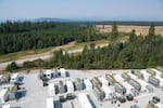 Ant Boxes (with SR-20 in the background) outside the Merkle Standard cryptocurrency mining facility in Usk, Wash. on Friday, Sept. 9, 2022 (Erick Doxey for InvestigateWest)