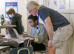 Calvin McRae, left, works with paraeducator David Waldrip at Cedar Park Middle School, Feb. 22, 2023. 