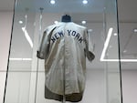 Babe Ruth's New York Yankees jersey, that he's said to have worn in a memorable Game 3 of the 1932 World Series, is displayed at Heritage Auction in Irving, Texas, days before its record sale.