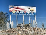 A restored World War II era Jeep serves as a Veterans memorial outside the Stellantis Jeep plant in Toledo, Ohio.