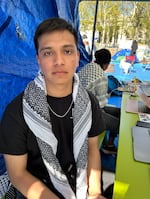 Jamil Dellawer, an MIT student, says the experience of camping inside the barricades has been a positive one. "I've made a lot more friends here than I have over the past three years," he admits.