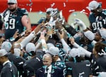 The Philadelphia Eagles celebrate with the Vince Lombardi Trophy after beating the Kansas City Chiefs 40-22 to win Super Bowl LIX at Caesars Superdome in New Orleans.