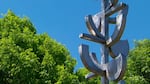 Lee Kelly's stainless steel sculpture shimmers in the sunlight at the Oregon Garden.