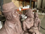The figures portrayed in "Crossing the Bridge" are of a Black family in the 1940s, when the Ferry Street Village was an active community. This piece will be rendered into a half-ton bronze piece that'll go in Alton Baker Park later in September 2026.