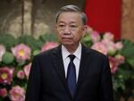 Vietnamese President To Lam is shown waiting for the arrival of Japanese former Prime Minister Yoshihide Suga at the Presidential Palace in Hanoi, Vietnam, on July 25, 2024.