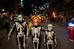Halloween revelers dressed in costumes march in New York City's 48th annual Greenwich Village Halloween Parade, Sunday, Oct. 31, 2021, in New York.