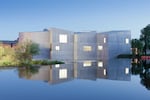 The Hepworth Wakefield art museum in West Yorkshire, U.K., is situated on the River Calder and is accessible only by footbridge.