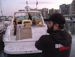 Sara the lion cub leaves via yacht at the Dbayeh sea port.