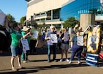 People rally to support Indiana Fever guard Sophie Cunningham after her comments on transgender athletes in women's sports before a WNBA basketball game between the Portland Fire and the Indiana Fever in Portland, Ore., Friday, July 31, 2026.