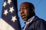 In this Nov. 15, 2020, file photo Raphael Warnock, a Democratic candidate for the U.S. Senate, speaks during a campaign rally in Marietta, Ga. As the head of the Atlanta church where Martin Luther King Jr. preached, Warnock has not shied away from impassioned sermons and forceful advocacy on behalf of the poor and disadvantaged. The 51-year-old now wants to take that progressive platform to the U.S. Senate. He is running to unseat one of Georgia's Republican senators, Kelly Loeffler, in the Jan. 5 race.