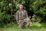 Private 1st Class John Vigiano kneels for a photo after completing the day movement course with other recruits in November Company 3rd Recruit Training Battalio at Marine Corps Recruit Depot, Parris Island on August 22 in Beaufort County, S.C.