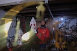 A Palestinian artisan makes traditional "fanous" lanterns as Muslim devotees prepare for the start of the holy fasting month of Ramadan in Rafah on Wednesday, March 6.