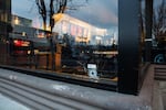A bullet hole in the front window of the Starbucks at Fred Meyer in Portland’s Hollywood District. Portland police officers shot a man thought to be armed Friday night, Dec. 7, 2018.