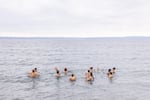 After a few minutes in the water, the group plunge begins to sound more like Sunday brunch, with conversation and laughter, rather than a gut-wrenching experience.