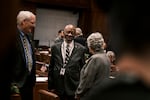 (Left to right) Senators Bill Hansel, Aaron Woods, center, Feb. 5, 2024, on the opening of the legislative short session at the Oregon state Capitol in Salem, Ore.