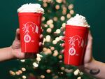 Starbucks Workers United members hope to win over customers who might not be thrilled with the strike by offering an even more exclusive commemorative item: A union-designed red cup with the Starbucks Workers United logo on the front.