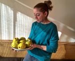 Portland chef Katy Millard, holding a dish of seasonal quince, finds the heart of Thanksgiving where tradition and its opposite collide. She poaches quince in simple syrup with star anise as a side or uses the poached quince in place of apples or pears in fall salads.