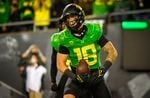 Oregon tight end Spencer Webb (18) celebrates his touchdown during the fourth quarter of an NCAA college football game Saturday, Sept. 25, 2021, in Eugene, Oregon. Webb died July 13, 2022 after after falling and striking his head.