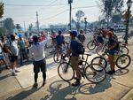 Cyclists with the Ashland Bike Brigade delegate tasks in Talent, a town that was devastated by the Almeda Fire.