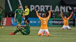 Portland Timbers midfielder Diego Valeri (8) and forward Jeremy Ebobisse (17) react at the end of the match at Providence Park. 