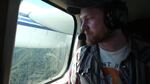 The aerial technician Jon Dachenhaus flies inland, searching for the signal from the missing murrelets in the coastal forests.