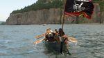 Members of the Portland All Nations Canoe Family pull 21 river miles on the fifth leg of their Canoe Journey from Beacon Rock to Washougal, Washington.