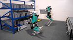 In this undated supplied photo, two humanoid Digit robots demonstrate the type of tasks they are capable of doing. Agility Robotics, creator of Digit, is about to open a first-of-its-kind robot production plant in Salem, Oregon. The 70,000 square foot facility will mass produce their humanoid robot, and the operation can be scaled to build up to 10,000 robots annually. 
