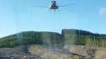 This photograph of a helicopter spraying herbicides is among hundreds whistleblower Darryl Ivy released after a month working for Applebee Aviation driving trucks and handling pesticides on Seneca Jones Timber Company sites.