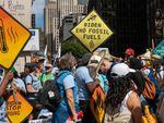 Thousands of activists, indigenous groups, students and others take to the streets of New York for the 'March to End Fossil Fuels' protest on Sunday.