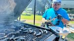 Yakama Nation member Evans Lewis grills lamprey.