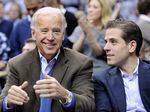 Then Vice President Joe Biden watches a basketball game with his son Hunter on Jan. 30, 2010.